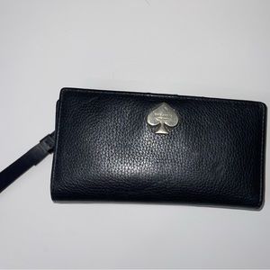 Kate spade wallet. Small black wallet with gold details.